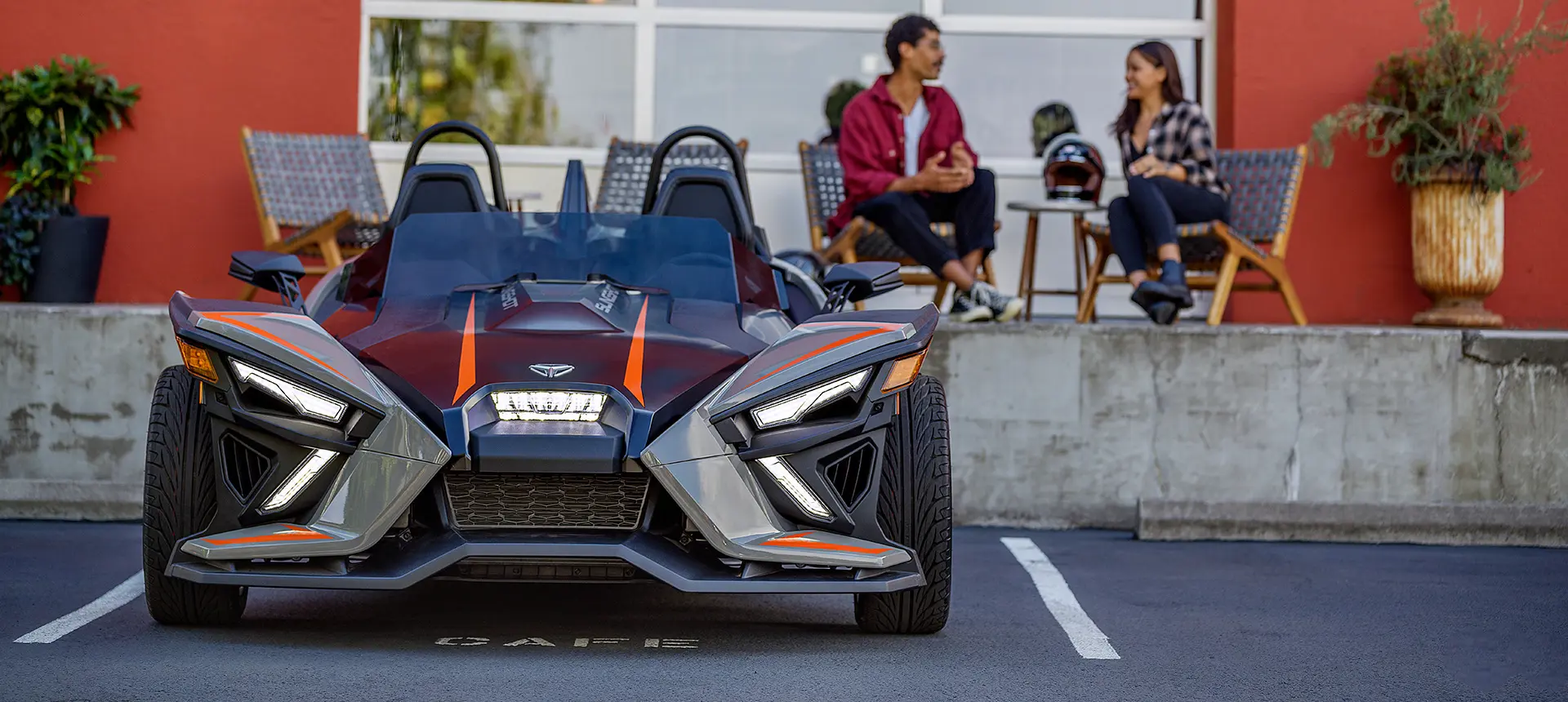 front end of a parked polaris slingshot slr three-wheeled motorcycle