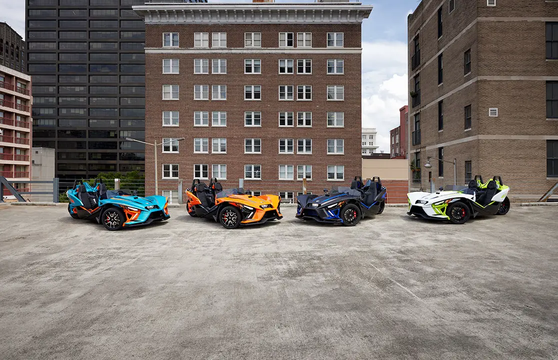 4 multi-colored polaris slingshot R three-wheeled motorcycles