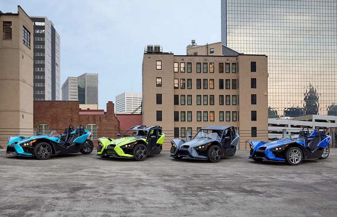 4 polaris slingshot sl roadsters in a lineup