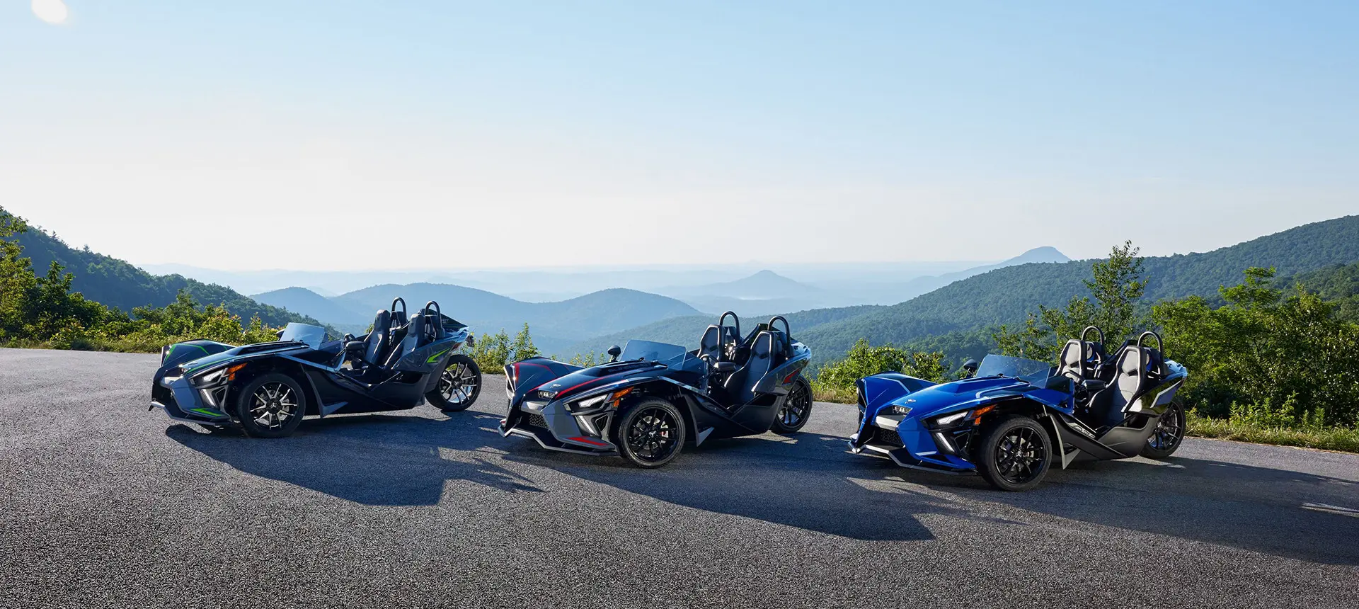 3 slingshot polaris en una alineación de modelos