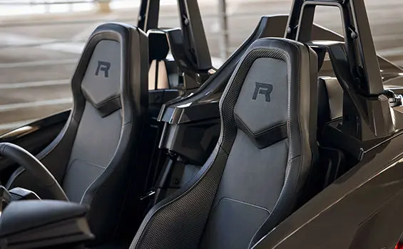 Two R exclusive seats on a 2025 Polaris Slingshot R three-wheeled roadster.