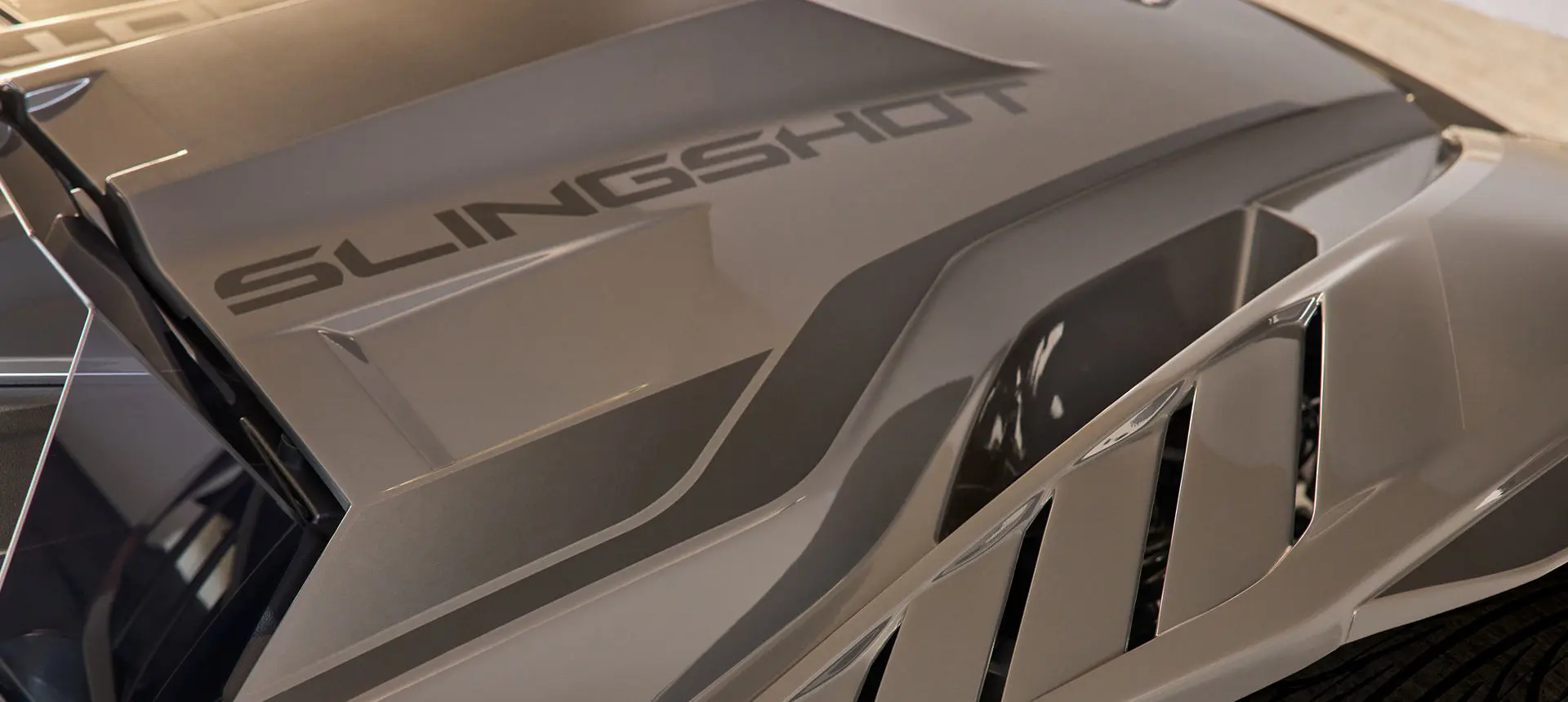 Close-up view of the hood on a 2025 Polaris Slingshot R three-wheeled motorcycle.