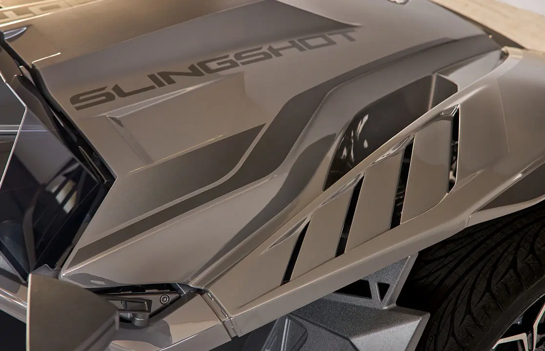 Close-up view of the hood on a 2025 Polaris Slingshot R three-wheeled motorcycle.