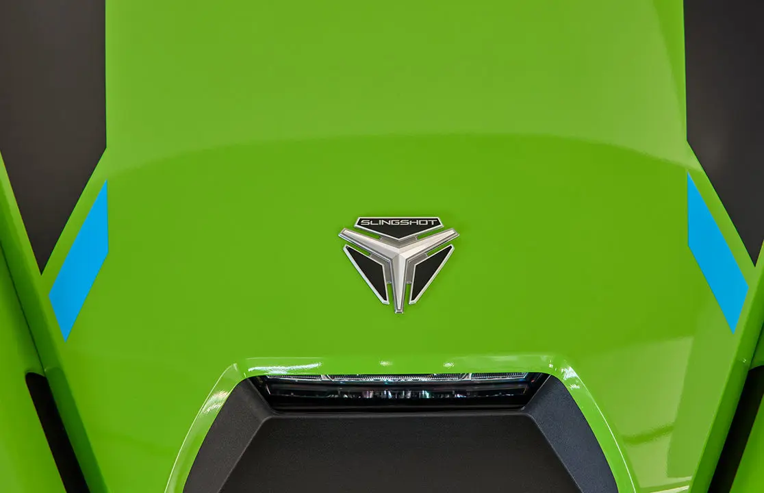 Close-up of the hood on a Liquid Lime 2025 Polaris Slingshot SL.