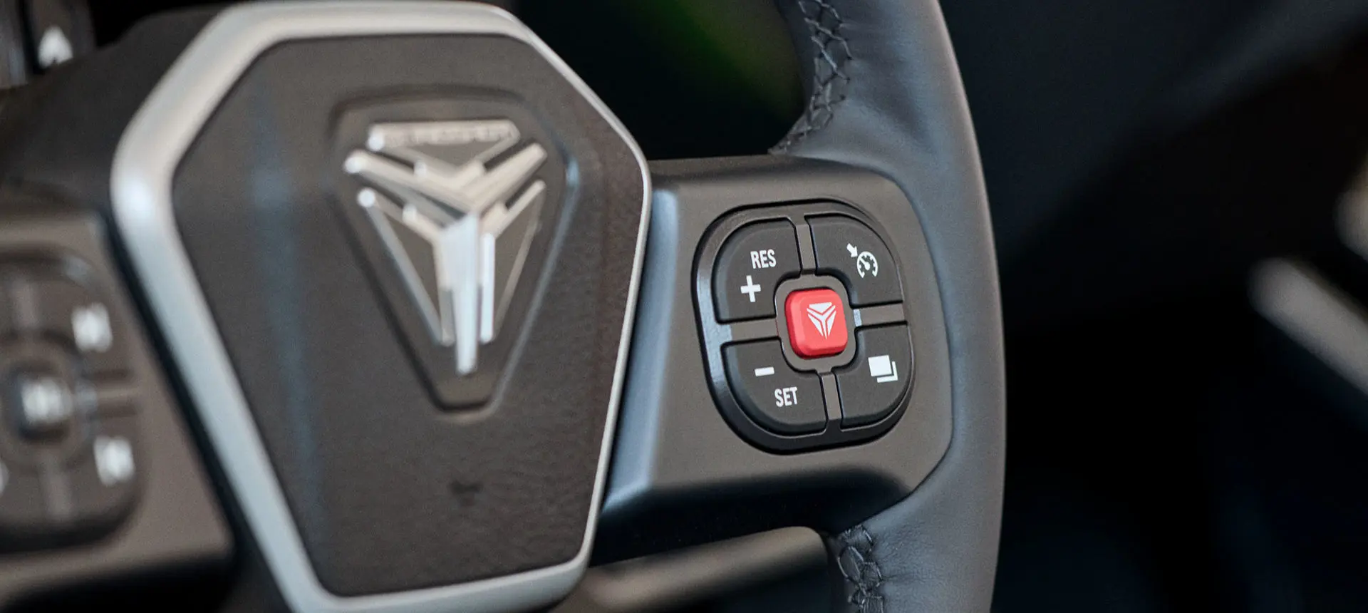 Steering wheel on a 2025 Polaris Slingshot SL three-wheeled motorcycle.