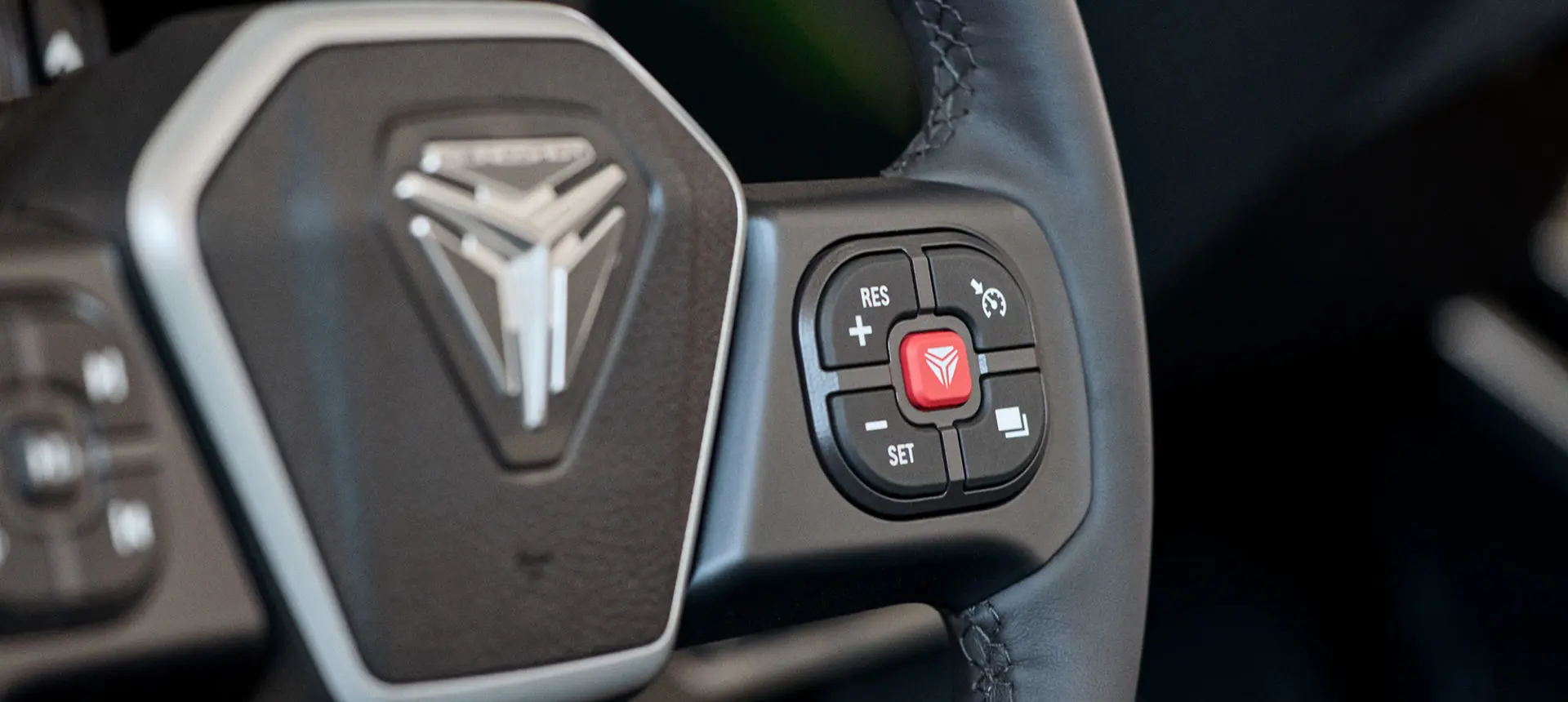 Steering wheel on a 2025 Polaris Slingshot SL three-wheeled motorcycle.
