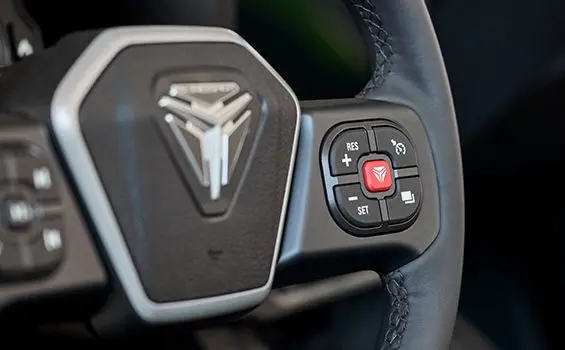 Steering wheel on a 2025 Polaris Slingshot SL three-wheeled motorcycle.