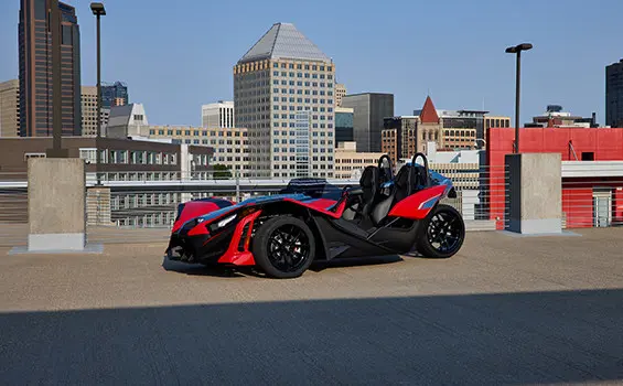 Side profile of a 2025 Polaris Slingshot SLR three-wheeled motorcycle.