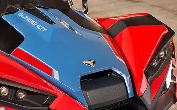 Closeup of the front end of a 2025 Polaris Slingshot SLR three-wheeled roadster.