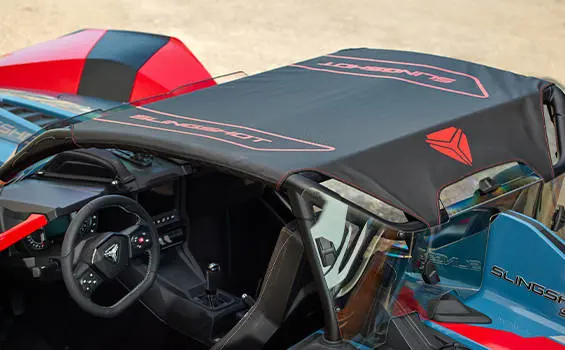 Red Canvas Excursion Top detail on a Polaris Slingshot.