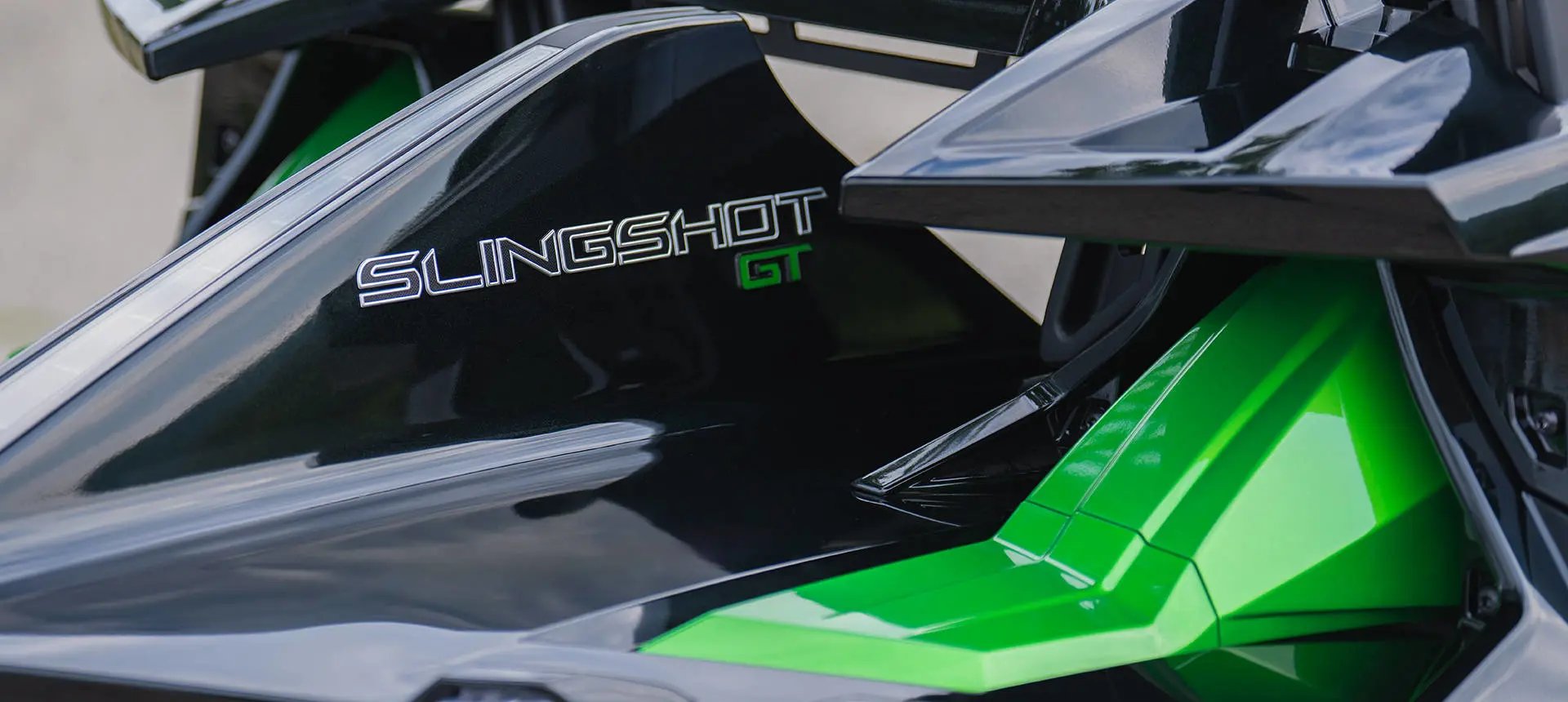 Closeup of the rear end features of a 2026 Polaris Slingshot Grand Touring limited edition three-wheeled roadster.