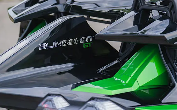 Closeup of the rear end features of a 2026 Polaris Slingshot Grand Touring limited edition three-wheeled roadster.