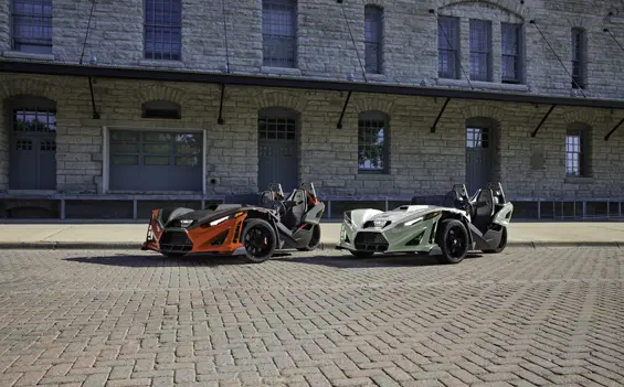 2 2026 Slingshot R three-wheel motorcycles parked side by side.