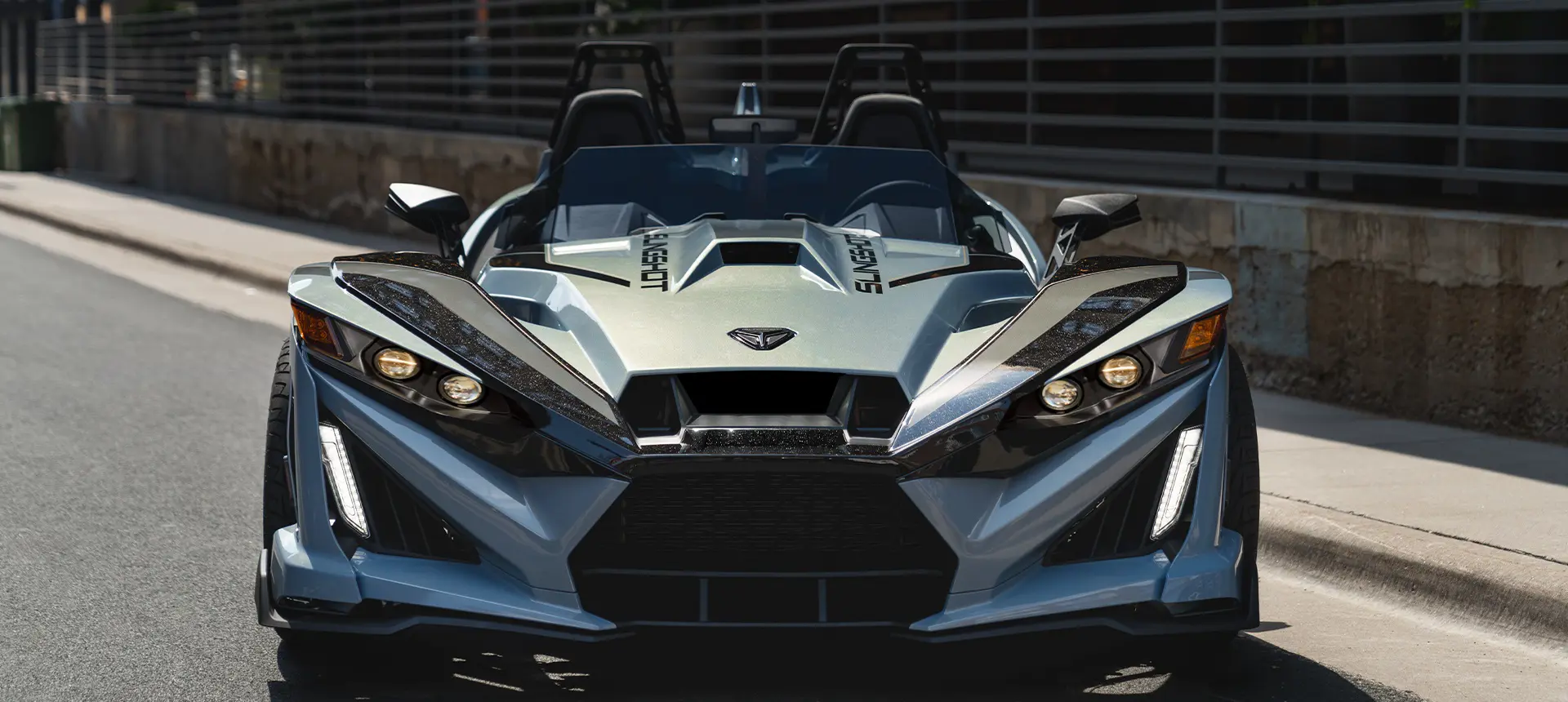 Front end view of a 2026 Polaris Slingshot Signature Edition 3-wheeled roadster.