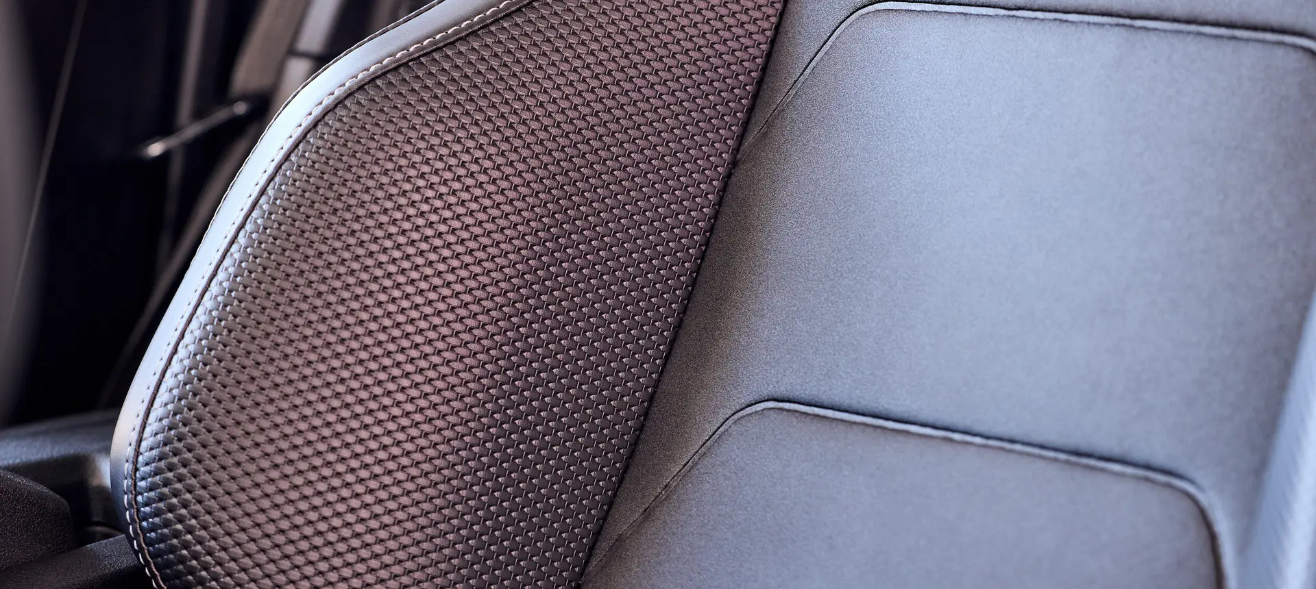 Closeup of the premium seats inside a 2026 Polaris Slingshot SLR three-wheel roadster.
