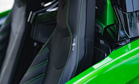 Heated and cooled seat detail in a Polaris Slingshot three wheel motorcycle, blending comfort with bold design.

