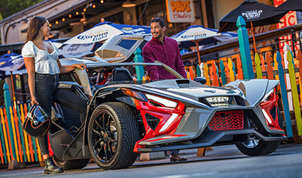 Polaris Slingshot parked in a commercial area