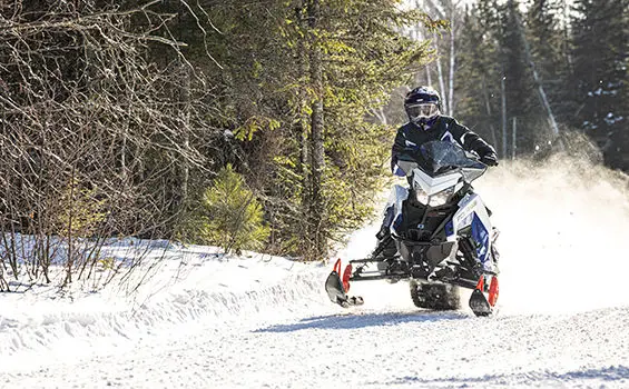 high performance trail riding on a polaris switchback xc snowmobile