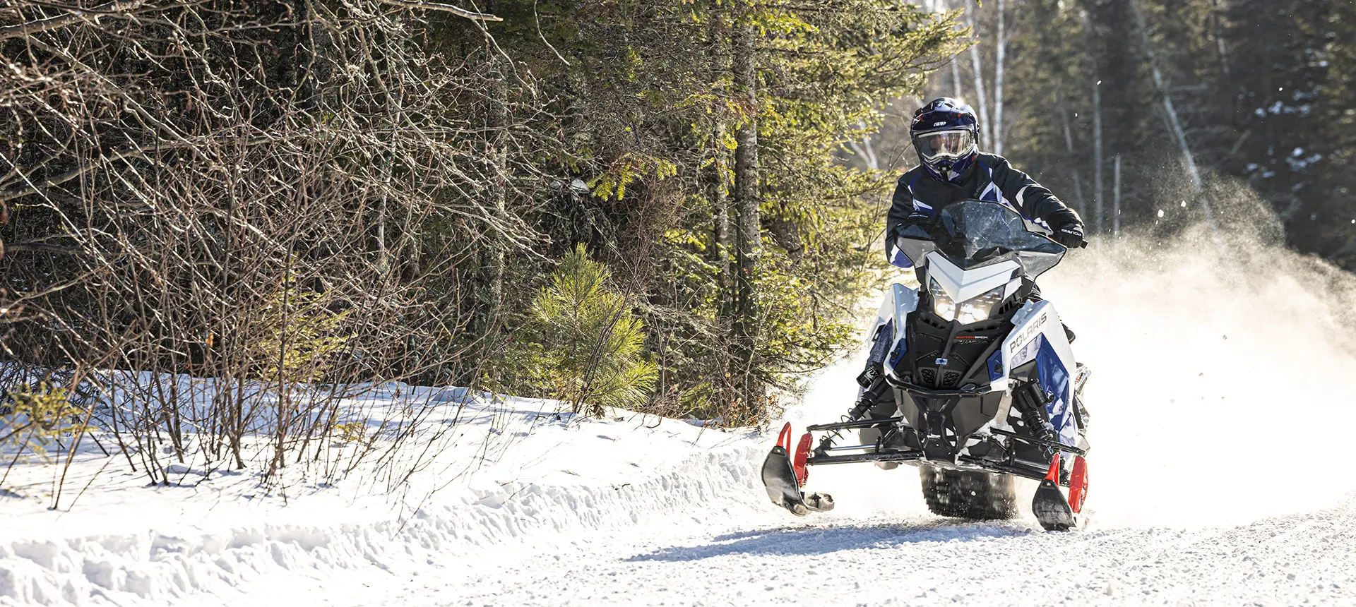 high performance trail riding on a polaris switchback xc snowmobile