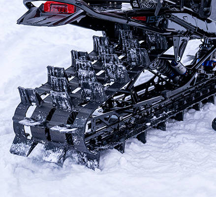 325 Series 9 track on a 2027 Polaris RMK Khaos mountain snowmobile.
