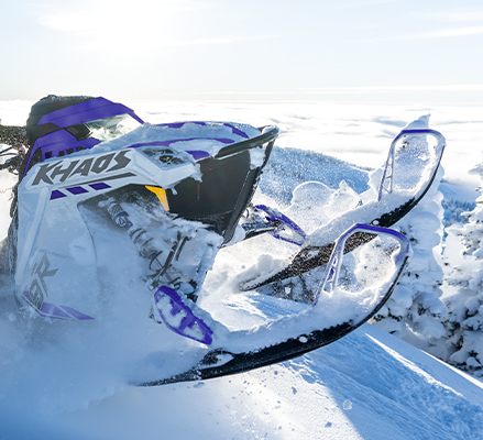 2027 Polaris RMK Khaos mountain snowmobile showcasing the Walker Evans Hi-Lo shocks.
