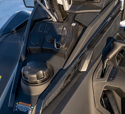 High and low speed transmission shifter on a 2027 Polaris TITAN Adventure Ultimate widetrack snowmobile.