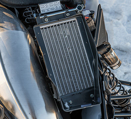 Underhood radiator on the 2027 Polaris TITAN SP widetrack snowmobile.