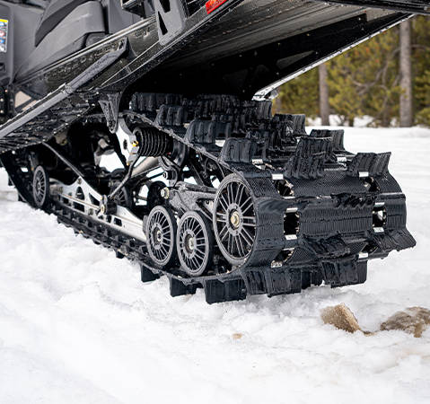 BackTrak15 rear suspension on a 2027 Polaris Voyageur Adventure Ultimate sport-utility snowmobile.