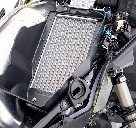 Underhood radiator on the 2027 Polaris Voyageur Adventure sport-utility snowmobile.
