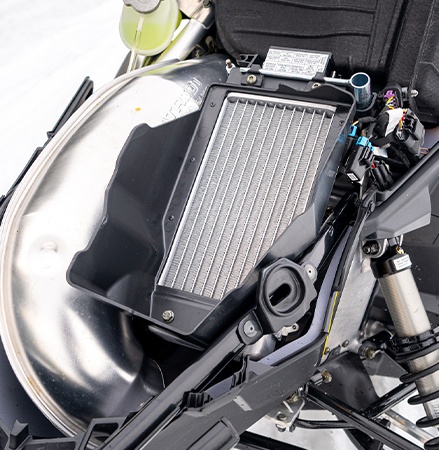 Underhood radiator on the 2027 Voyageur Nordic Pro sport utility snowmobile.
