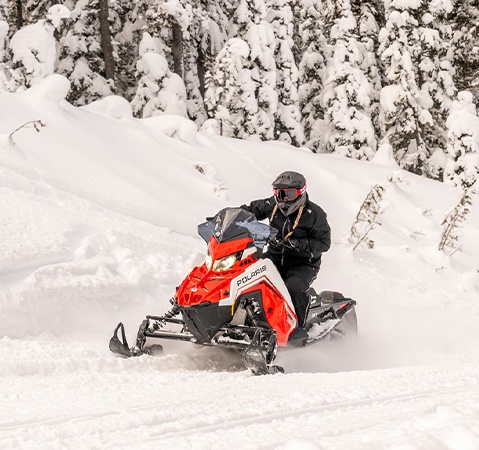 Rider on a 2027 Polaris Snowmobile with the 850 Patriot engine showcasing it's legendary durability.