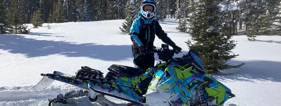 Miranda Hamlin riding a Snowmobile