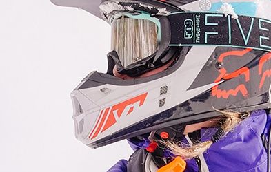Hayley Alud riding a snowmobile