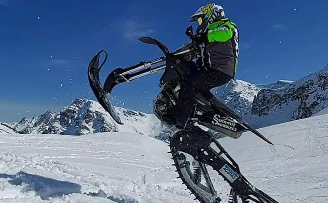 Tessa Mason jump with a Polaris Timbersled