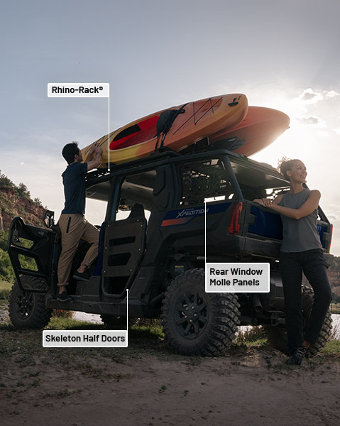 Rhino-Rack roof rack, J-Style kayak holder, rear window molle panels and skeleton half door accessories from the Kayak Package installed on a 2025 Polaris XPEDITION XP 5 side-by-side.