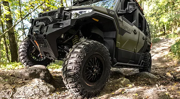 Closeup of the tires on a 2025 Polaris XPEDITION ADV 5 NorthStar side-by-side.