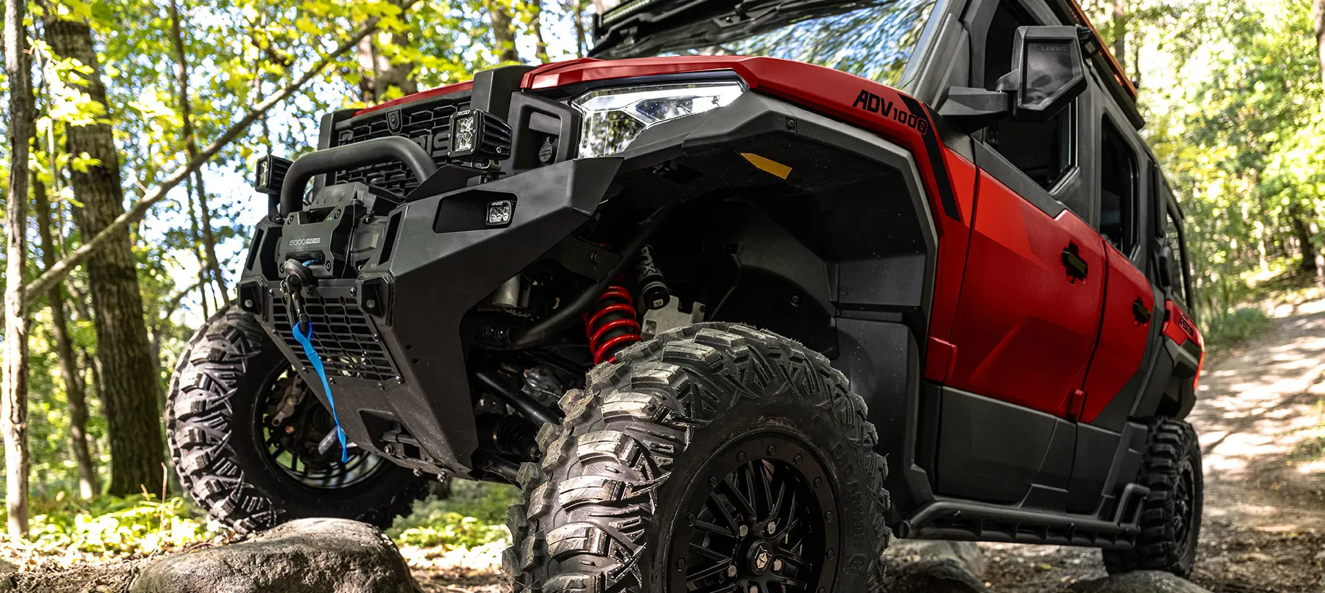 Closeup of the front end of a 2026 Polaris XPEDITION ADV performance SxS.