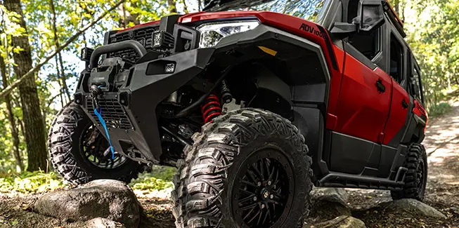 Closeup of the front end of a 2026 Polaris XPEDITION ADV performance SxS.
