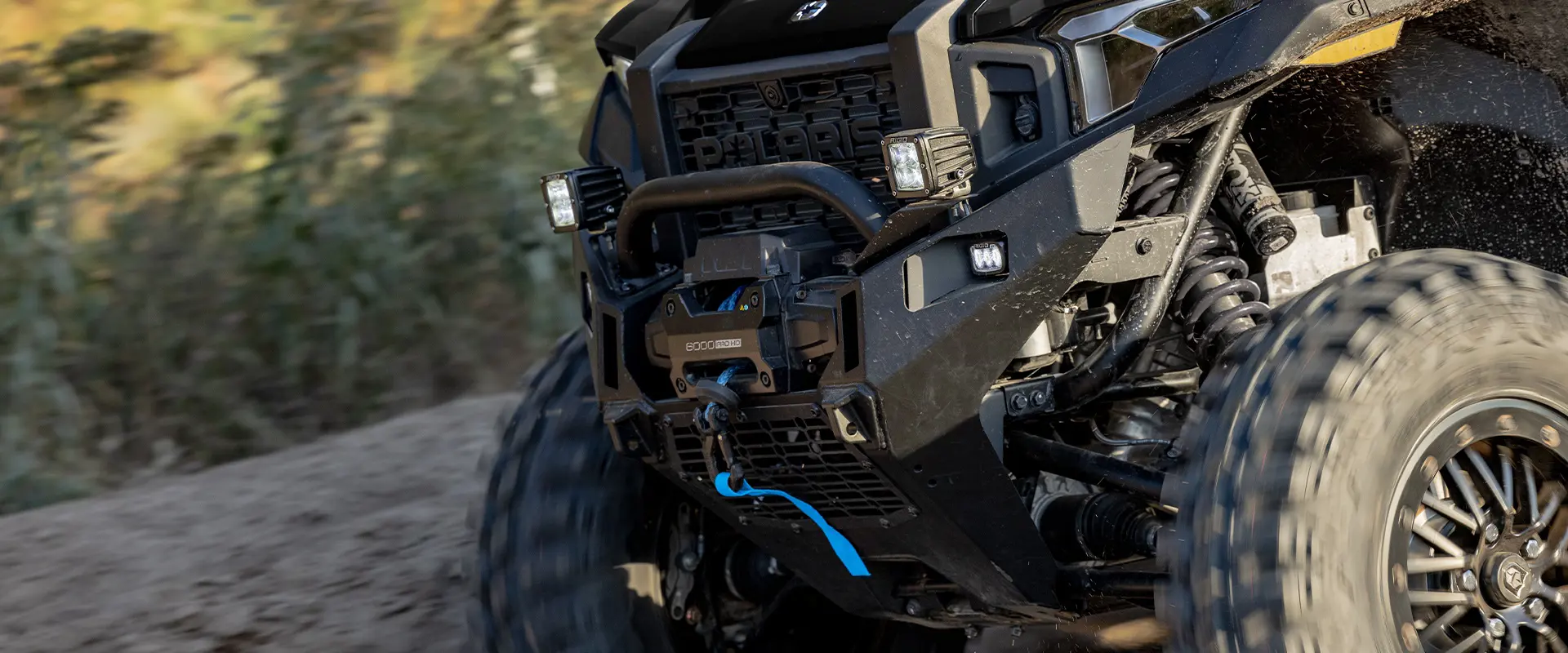 Closeup of the winch on a 2026 Polaris XPEDITION ADV NorthStar performance side-by-side.