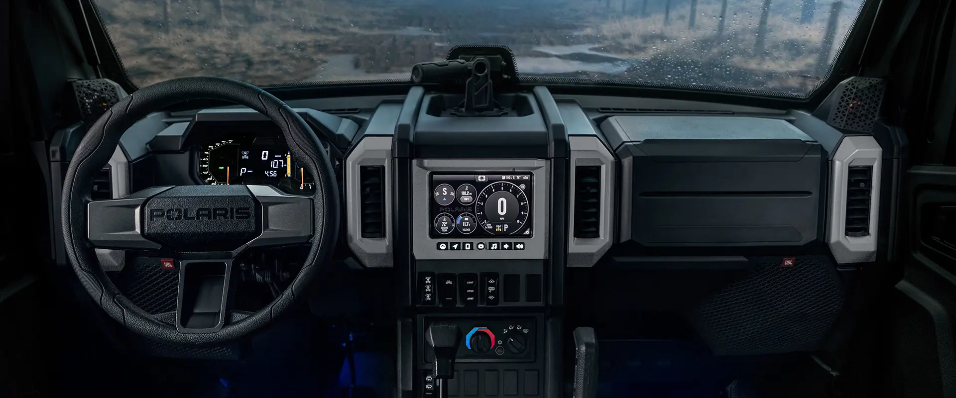 Interior view of the cab of a 2026 Polaris XPEDITION ADV NorthStar performance side-by-side.