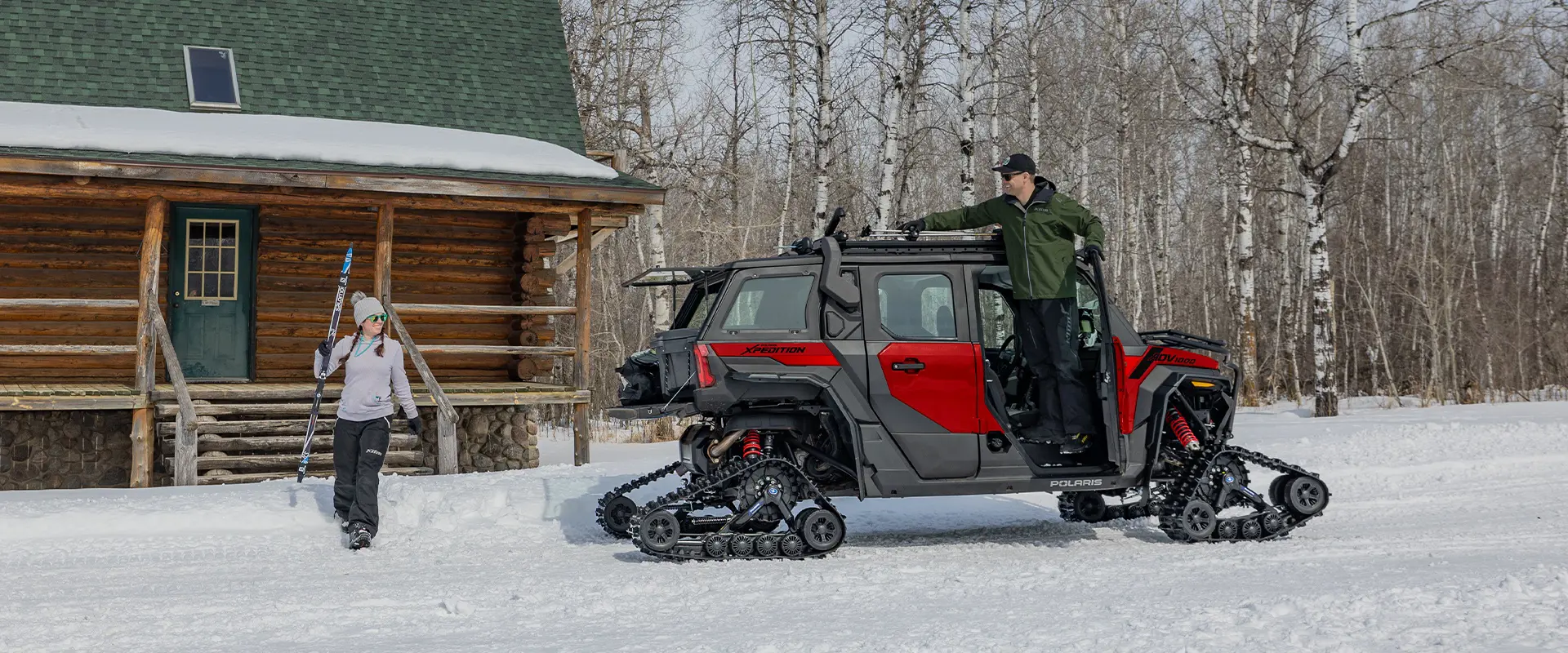 Side profile of a 2026 Polaris XPEDITION ADV NorthStar performance side-by-side with tracks installed.