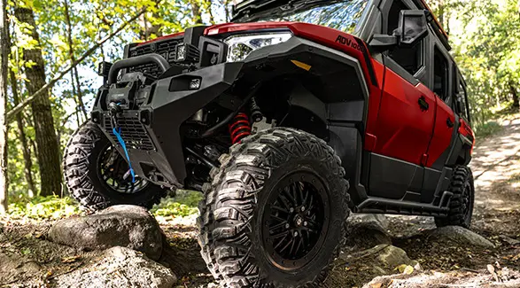 Front-end closeup of a 2026 Polaris XPEDITION ADV NorthStar performance side-by-side.