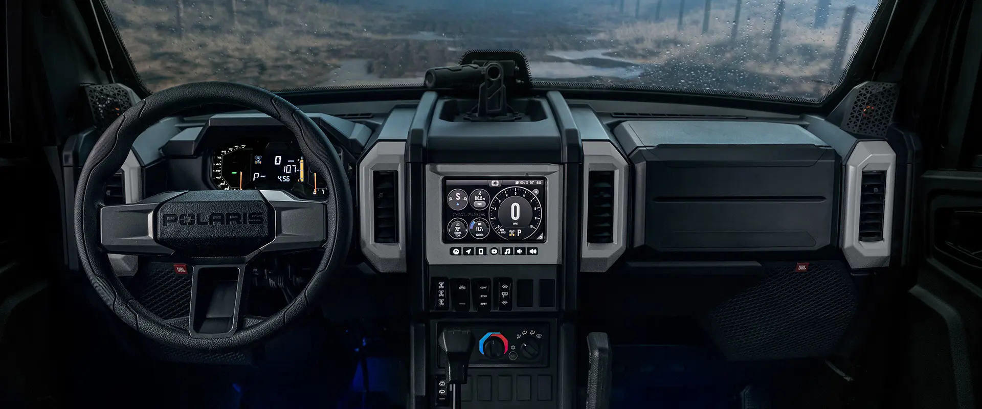 Interior view of the enclosed cab of a 2026 Polaris XPEDITION XP NorthStar side-by-side.