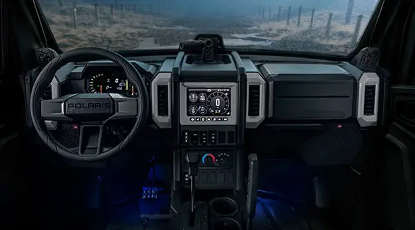 Interior view of the enclosed cab of a 2026 Polaris XPEDITION XP NorthStar side-by-side.