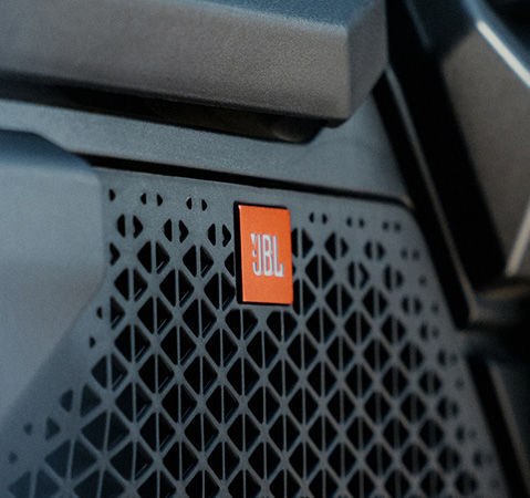 JBL Trail Pro audio system in the enclosed cab of a 2027 Polaris XPEDITION ADV side-by-side.
