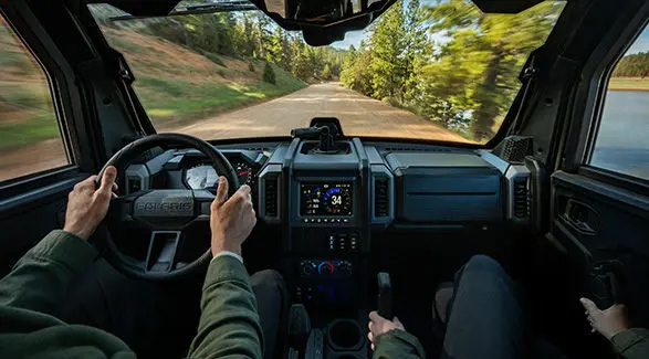Enclosed cab amenities of a 2027 Polaris XPEDITION XP NorthStar side-by-side.