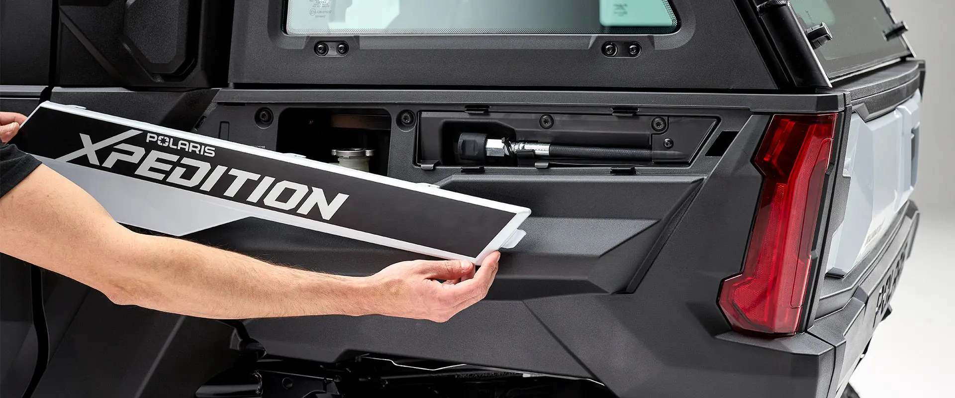 Quick access panel on a 2027 Polaris XPEDITION ADV NorthStar side-by-side.