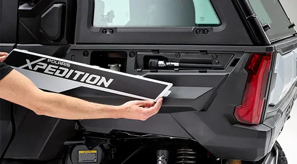 Quick access panel on a 2027 Polaris XPEDITION ADV NorthStar side-by-side.